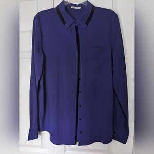 Chic Blue Blouse with Black Trim